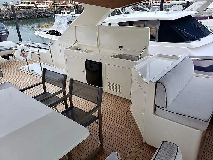 a deck with a group of boats aboard ALL RUMORS Yacht for Sale