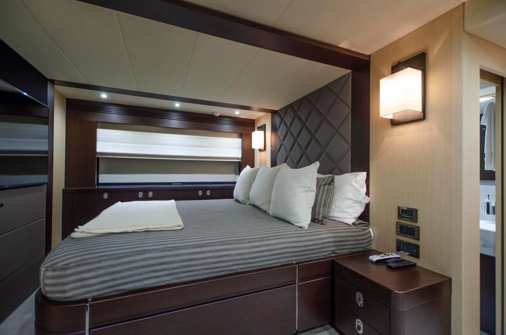 a bed with a white sheet aboard SECOND THOUGHTS Yacht for Sale
