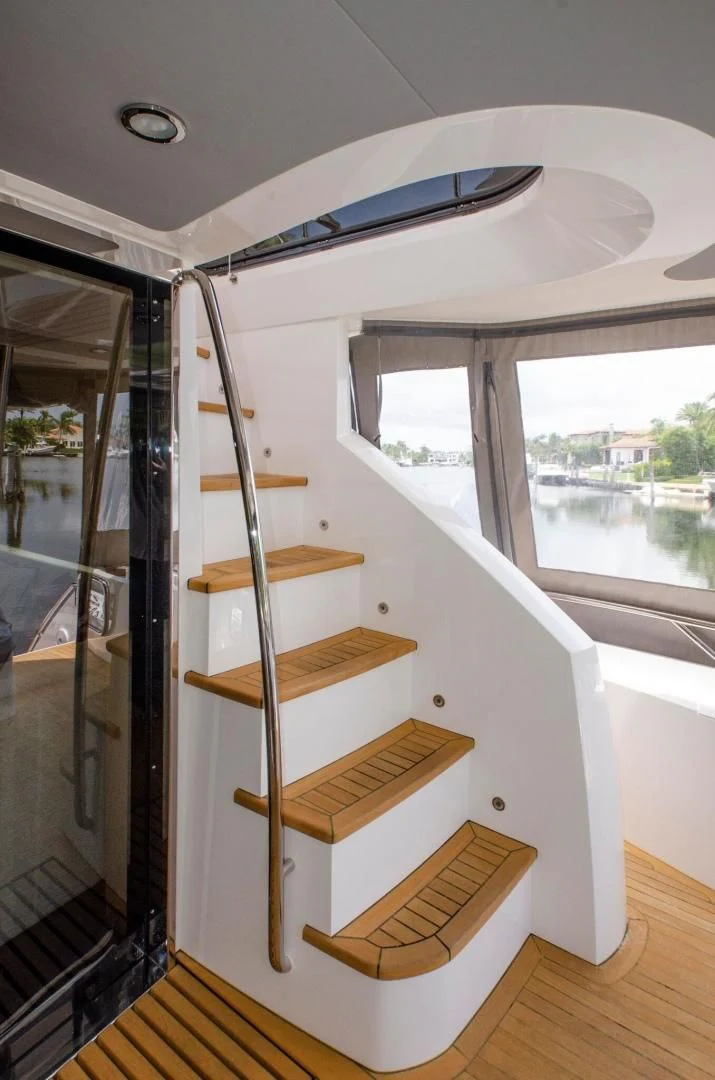 a room with a bunk bed and a window aboard SECOND THOUGHTS Yacht for Sale