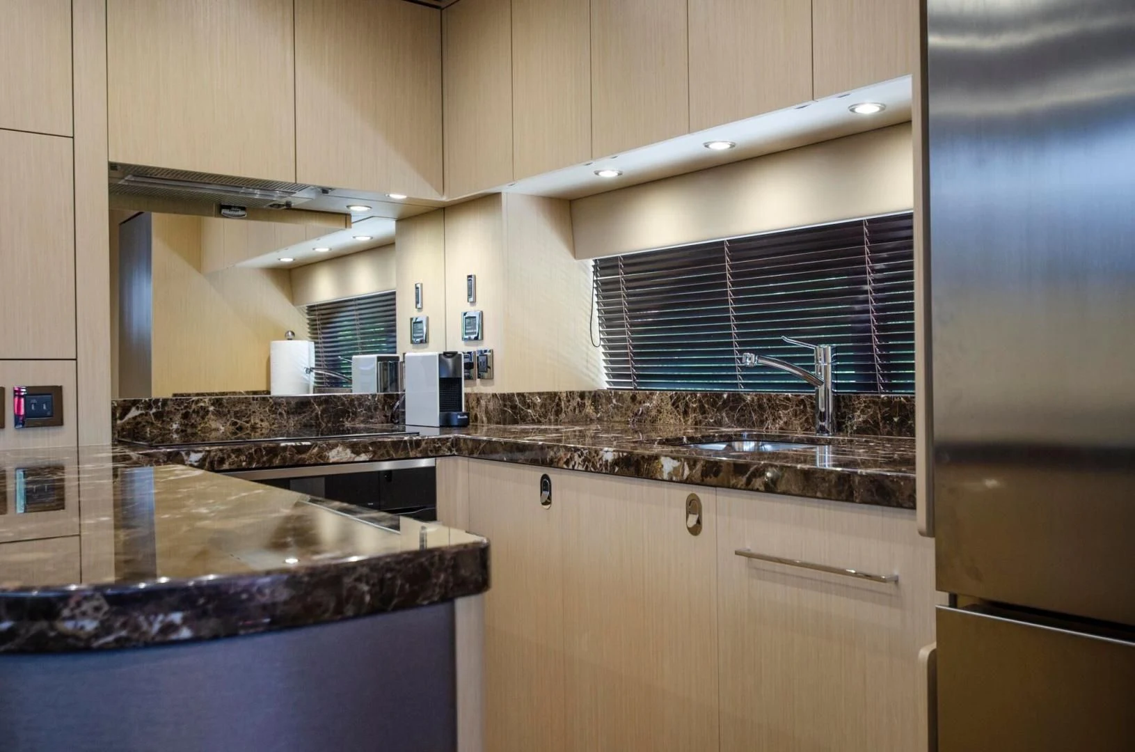 a kitchen with a stainless steel stove aboard SECOND THOUGHTS Yacht for Sale