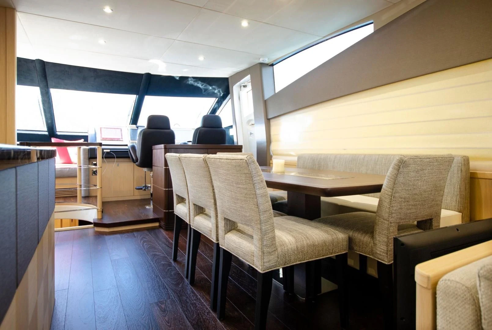 a room with chairs and a table aboard SECOND THOUGHTS Yacht for Sale