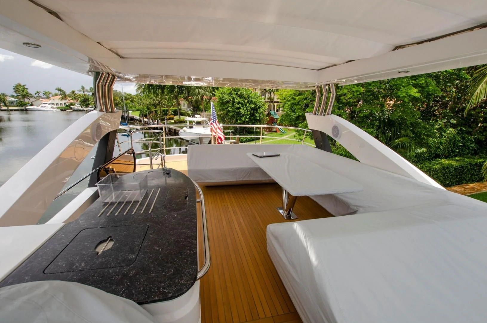 a room with a wood floor and several white tents aboard SECOND THOUGHTS Yacht for Sale