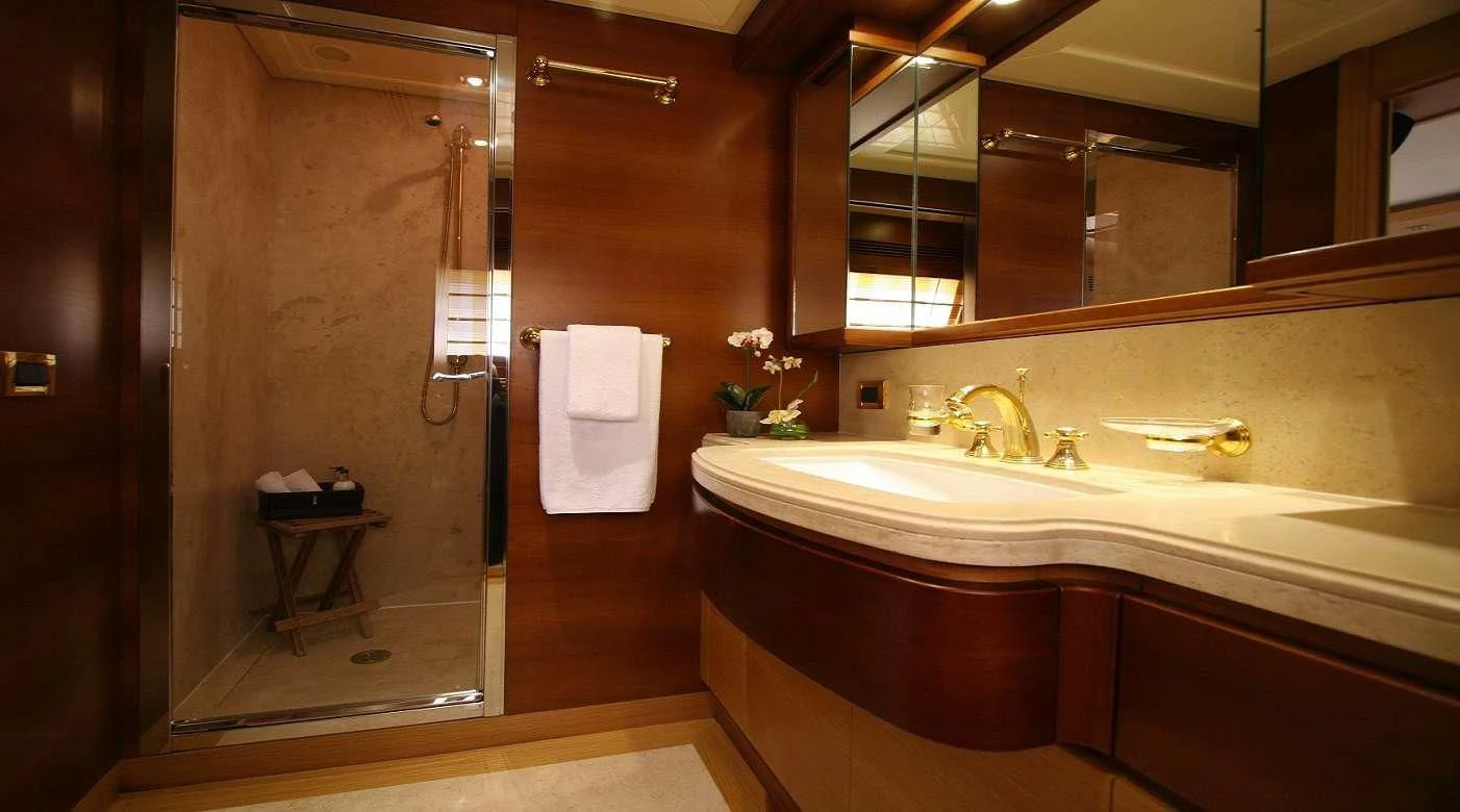 a bathroom with a sink and a shower aboard PAREAKKI Yacht for Sale