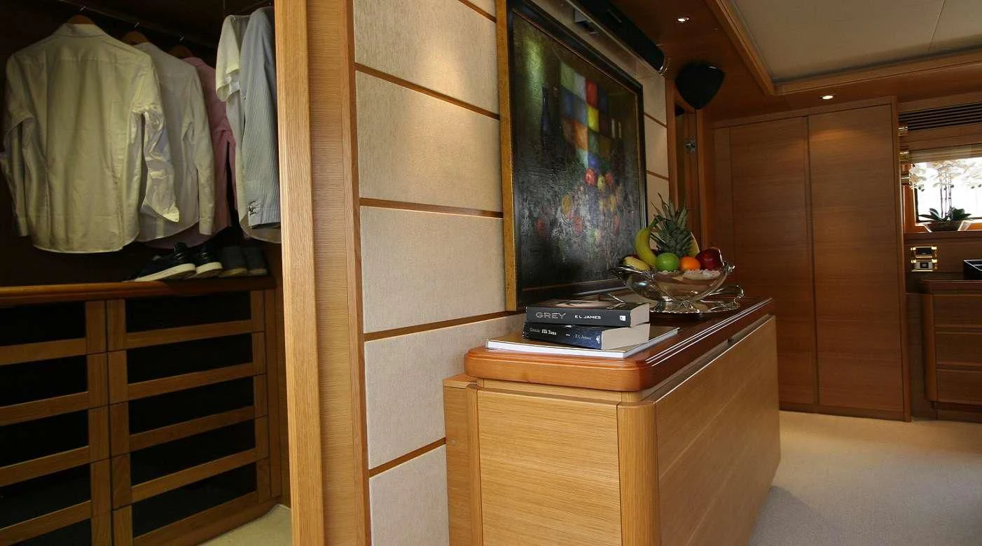 a room with a desk and a computer aboard PAREAKKI Yacht for Sale