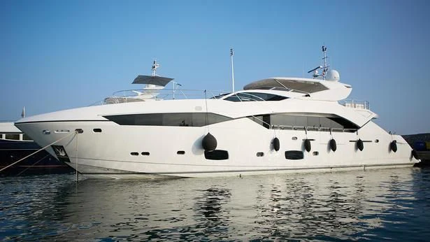 a white yacht on the water aboard MAKANI II Yacht for Charter