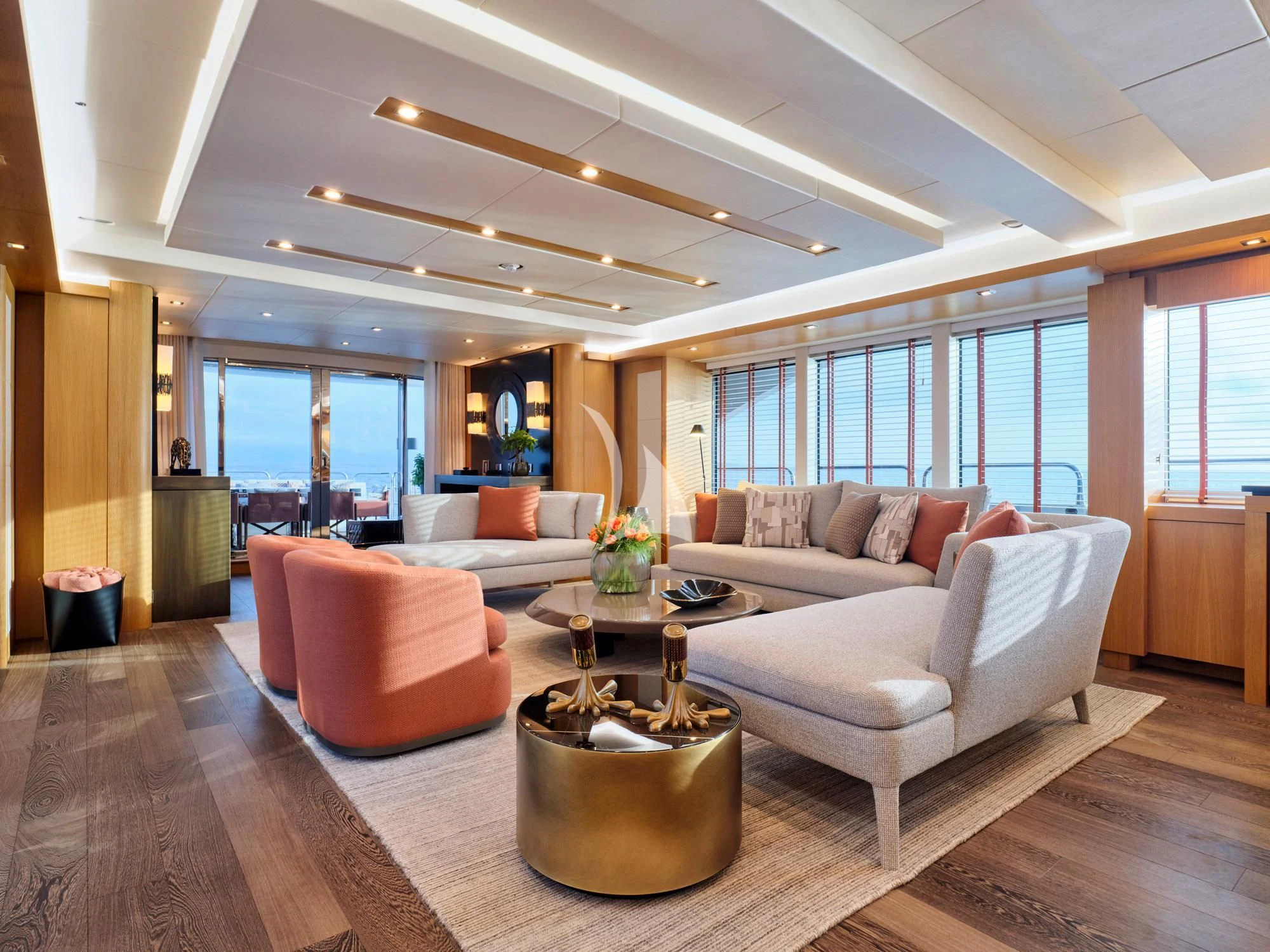 a living room with a large window aboard MAKANI II Yacht for Charter