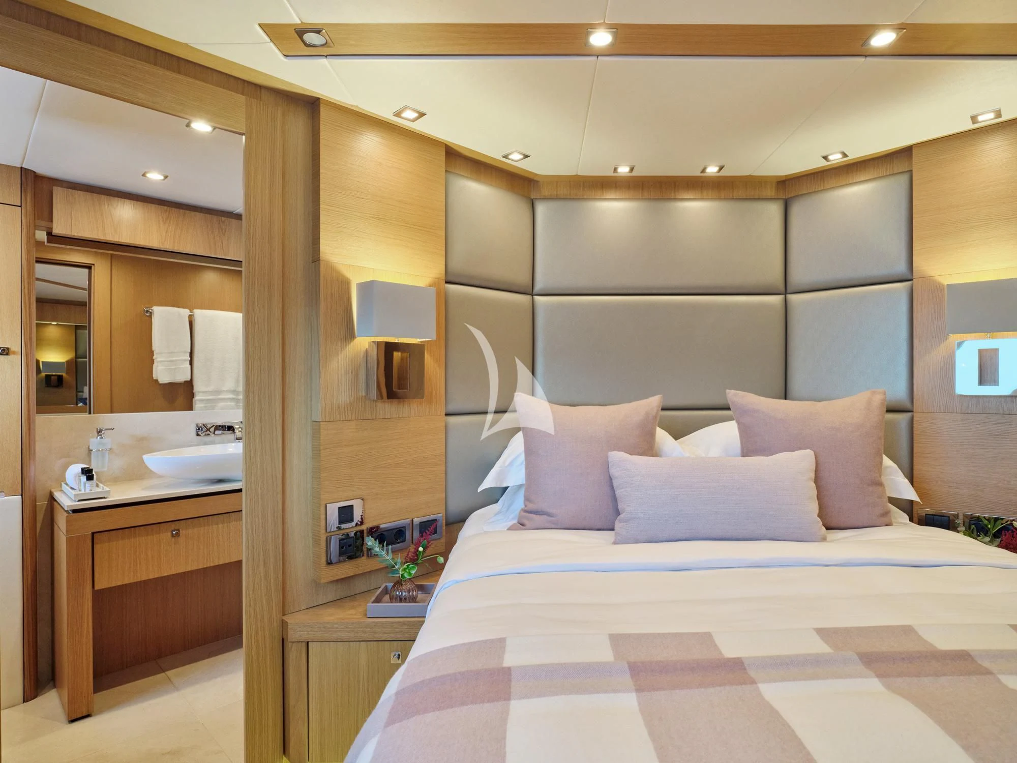 a hotel room with a bed aboard MAKANI II Yacht for Charter