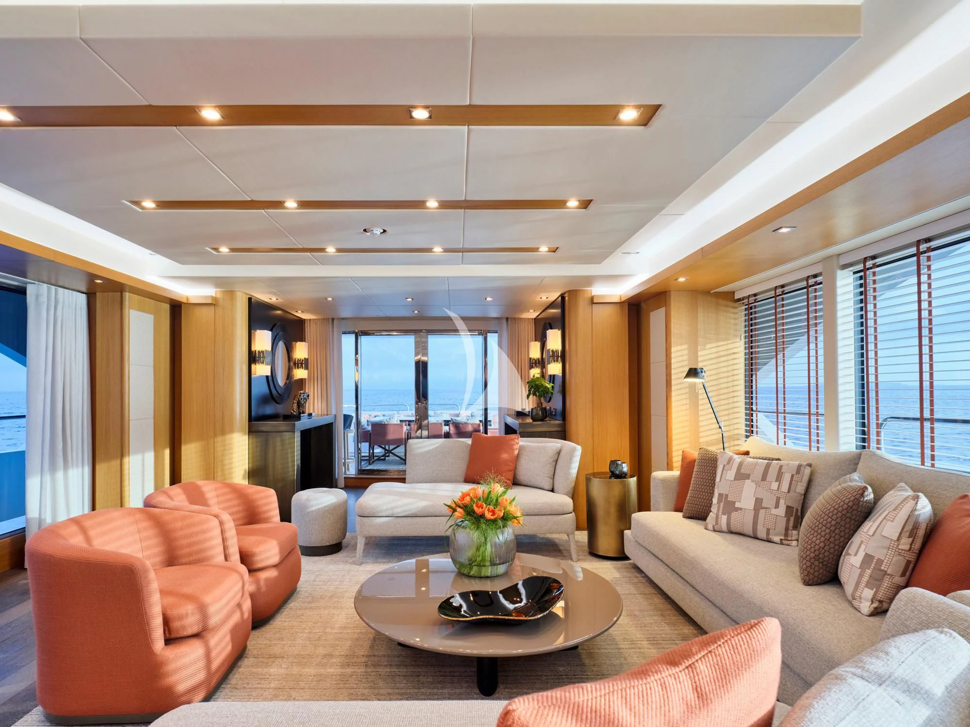 a living room with a large window aboard MAKANI II Yacht for Charter