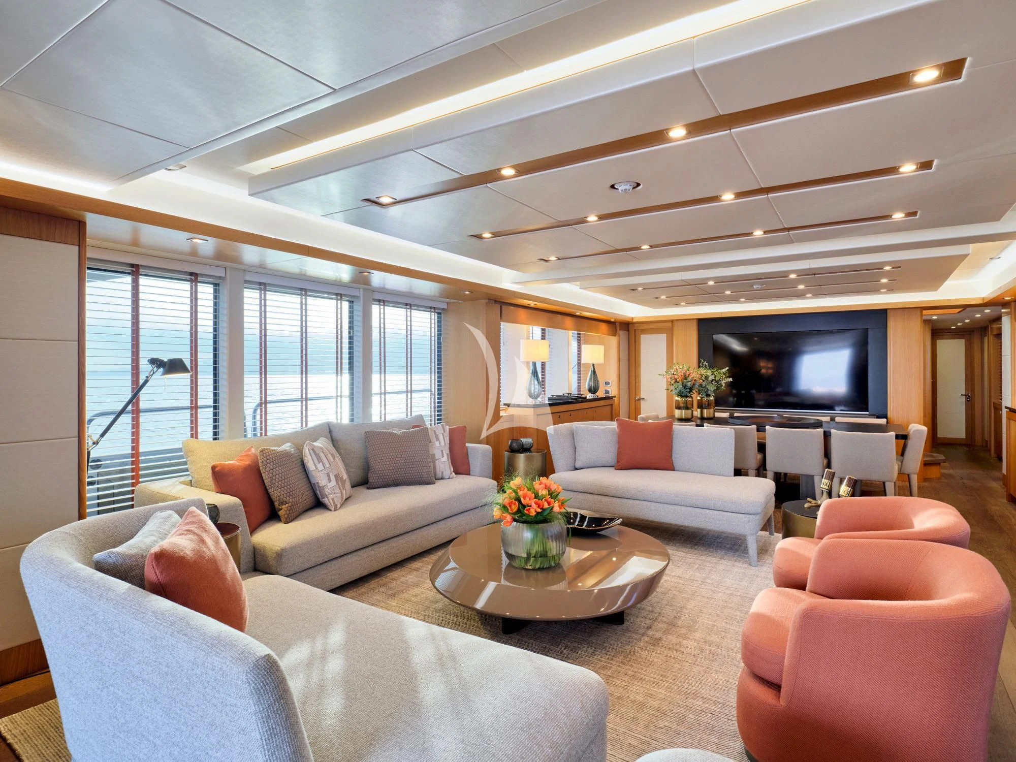 a living room with a large window aboard MAKANI II Yacht for Charter