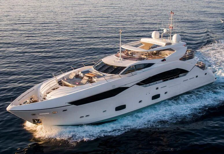 a white yacht on the water aboard MAKANI II Yacht for Charter