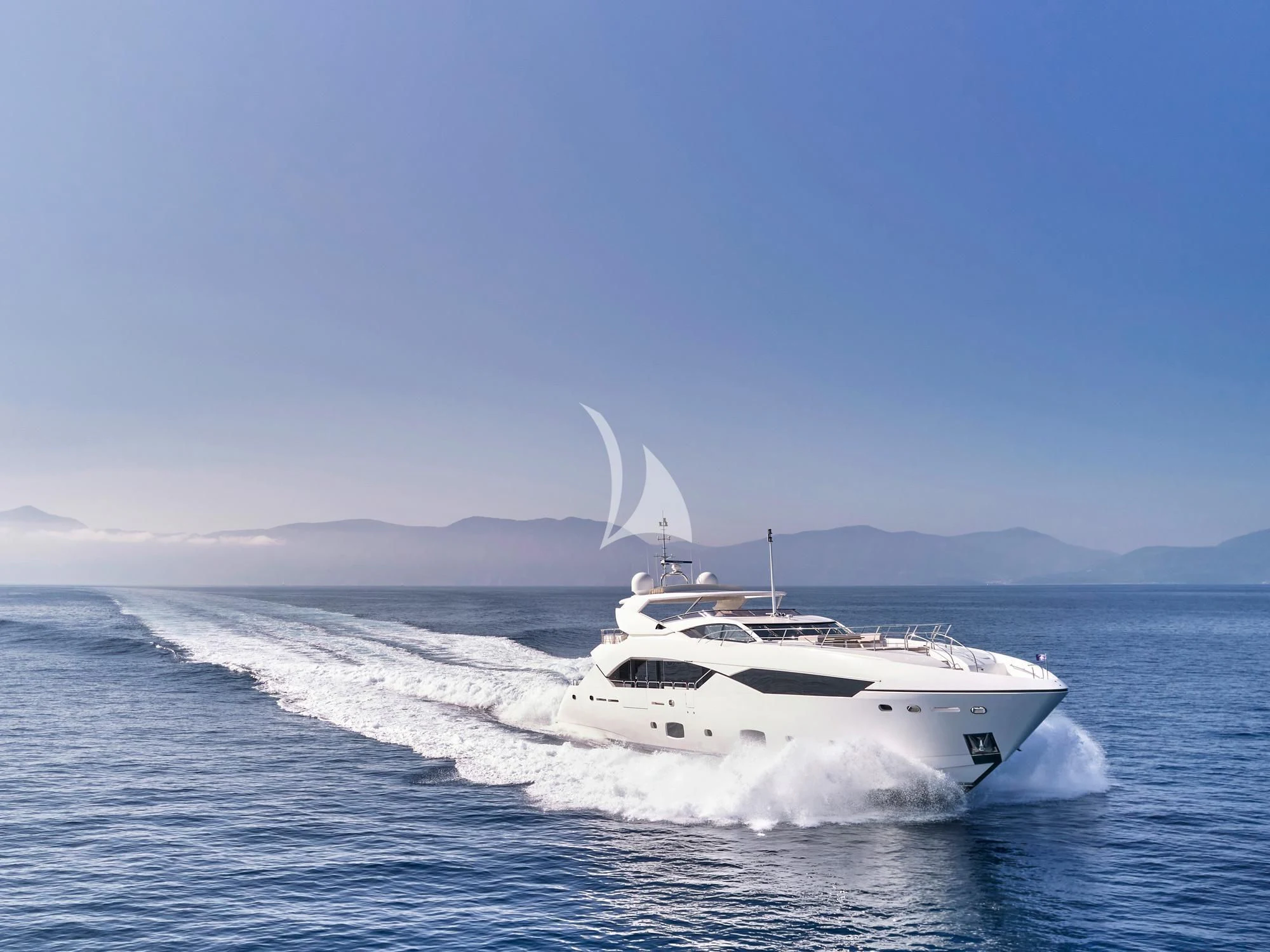 a white yacht on the water aboard MAKANI II Yacht for Charter