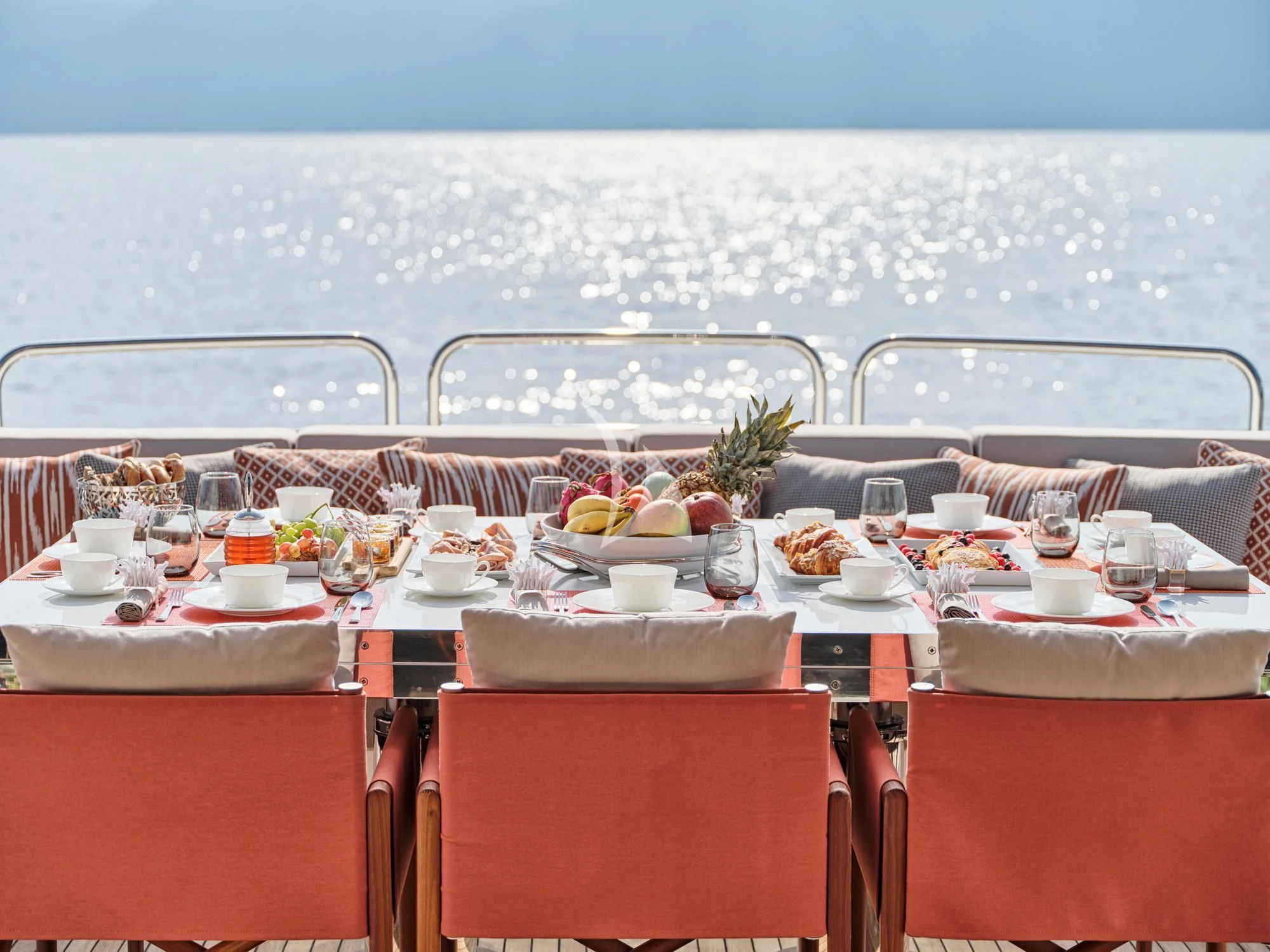 a table with food on it aboard MAKANI II Yacht for Charter