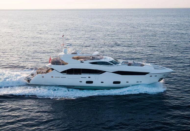 a white yacht in the ocean aboard MAKANI II Yacht for Charter