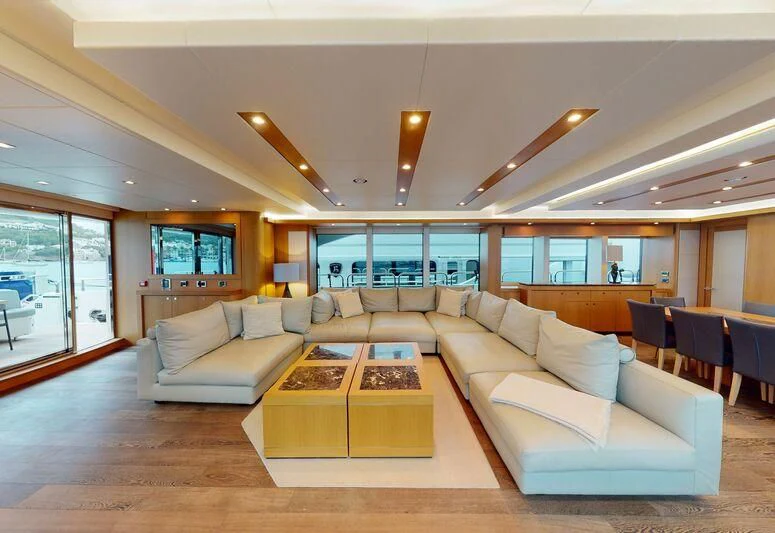 a living room with a large open window aboard MAKANI II Yacht for Charter