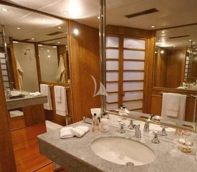 a bathroom with a large mirror aboard SEA LADY II Yacht for Sale