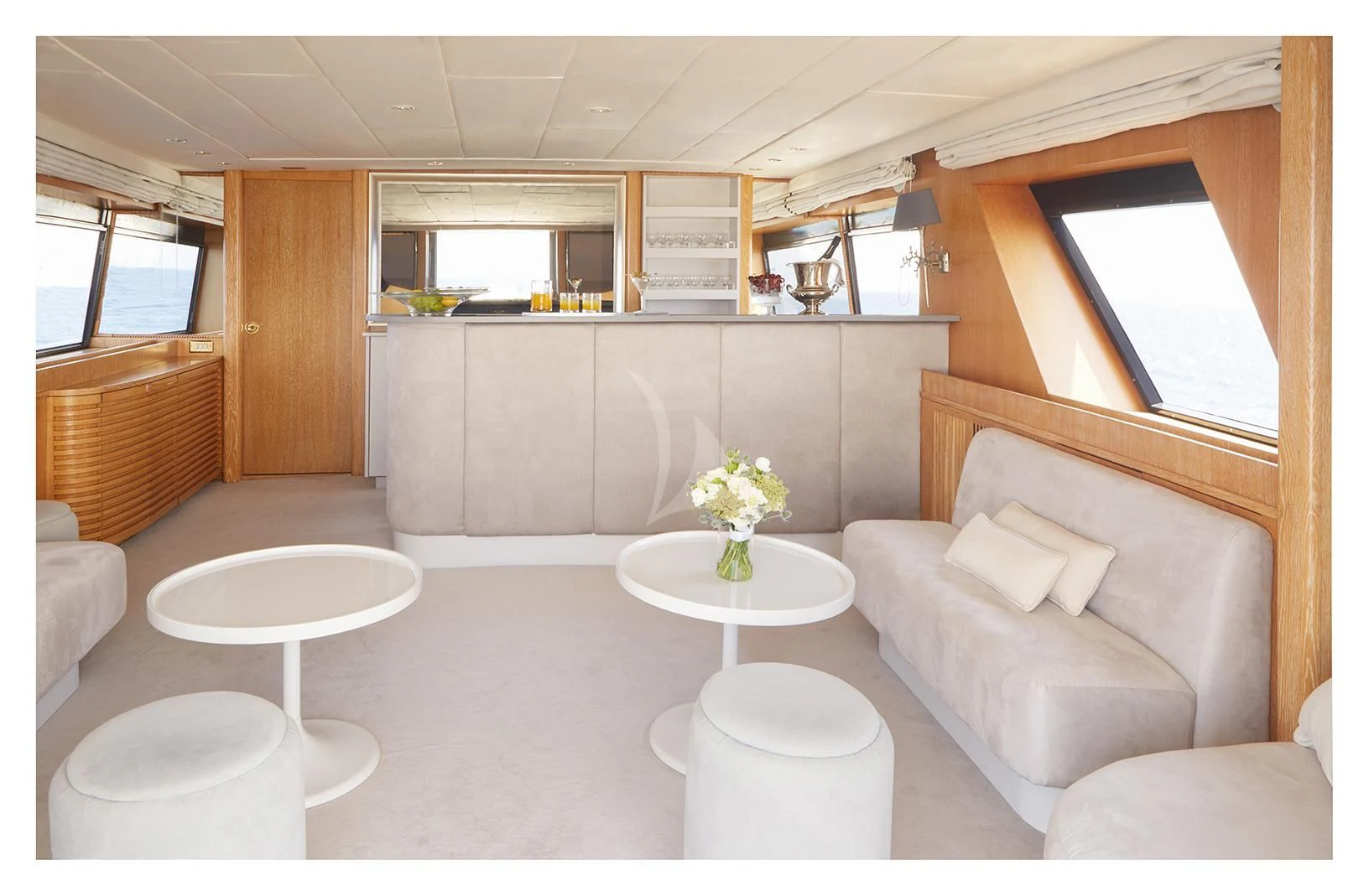 a room with a couch and a table aboard SEA LADY II Yacht for Sale