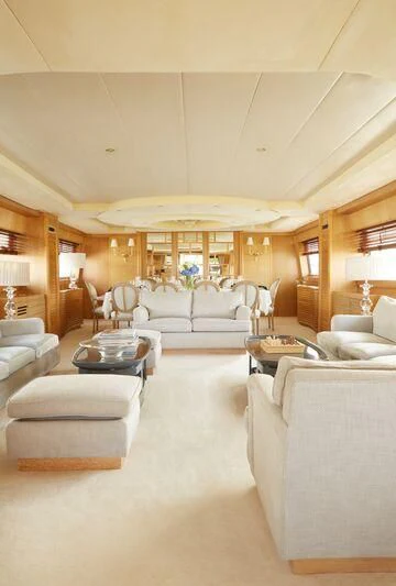 a living room with a large open door aboard SEA LADY II Yacht for Sale