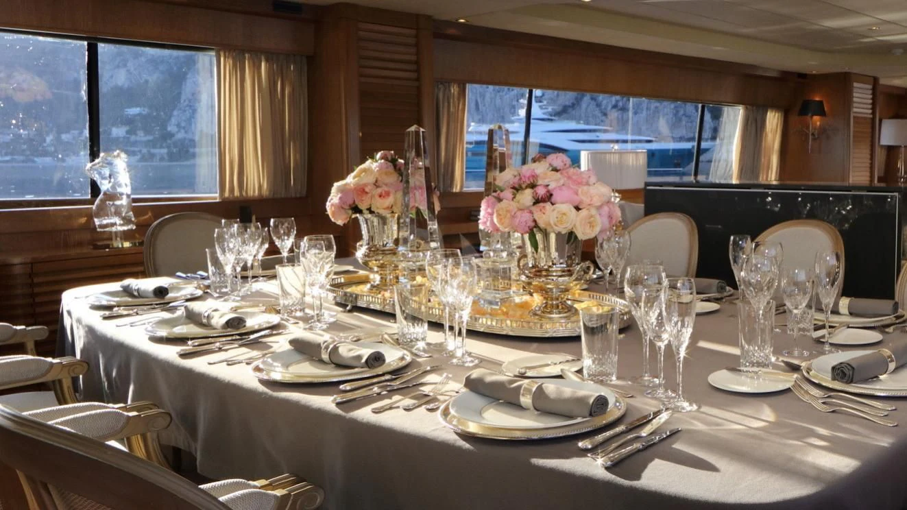 a table set for a wedding aboard SEA LADY II Yacht for Sale