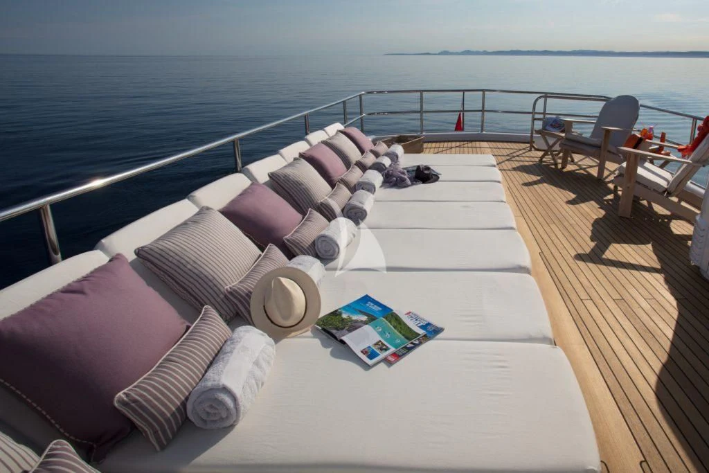 a bed on a deck aboard SEA LADY II Yacht for Sale