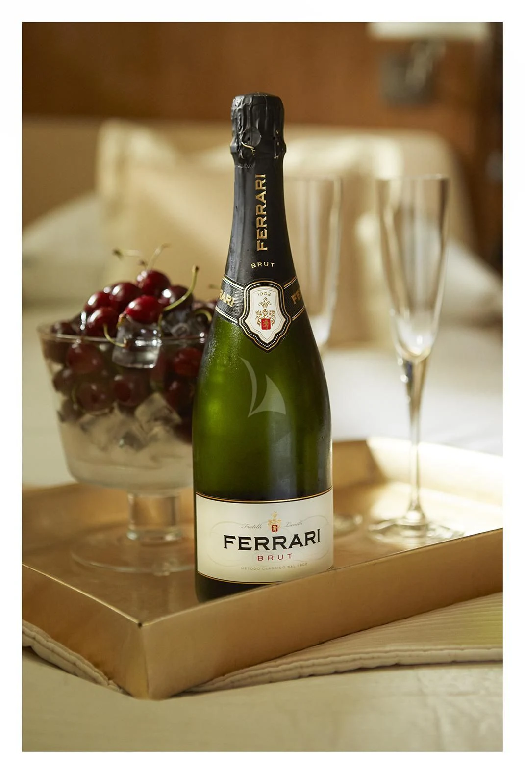 a bottle of champagne and a glass of champagne aboard SEA LADY II Yacht for Sale
