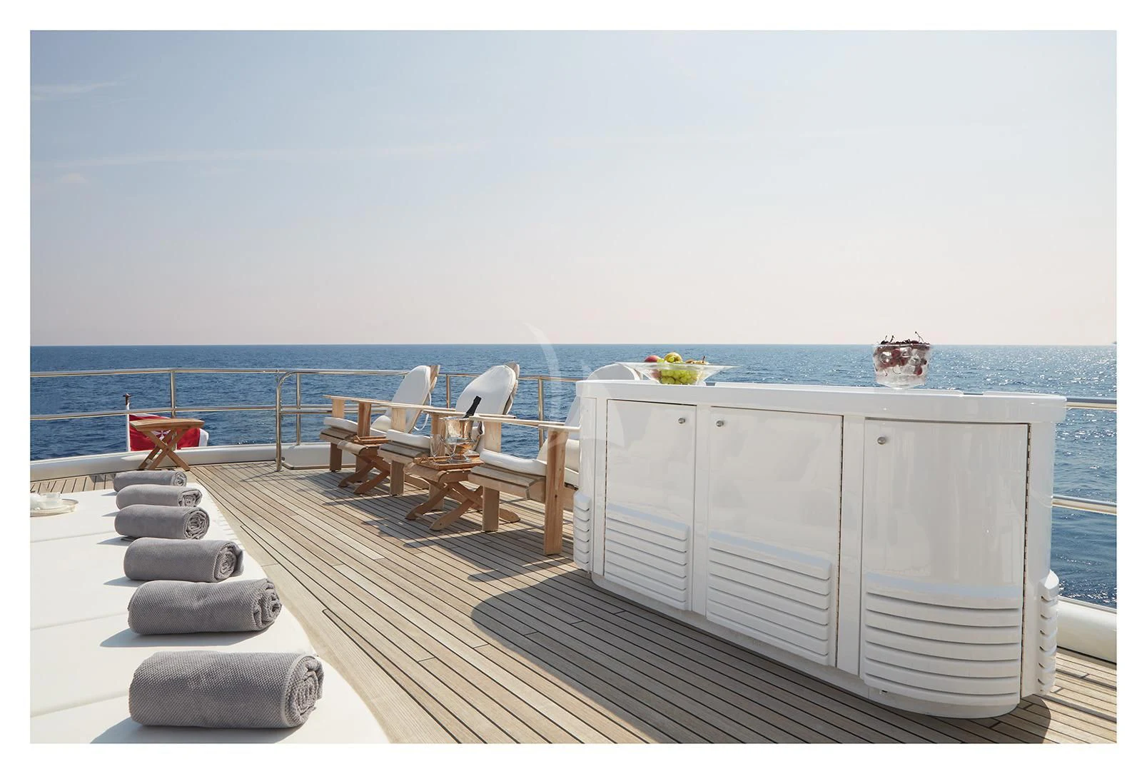 a white boat on a dock aboard SEA LADY II Yacht for Sale