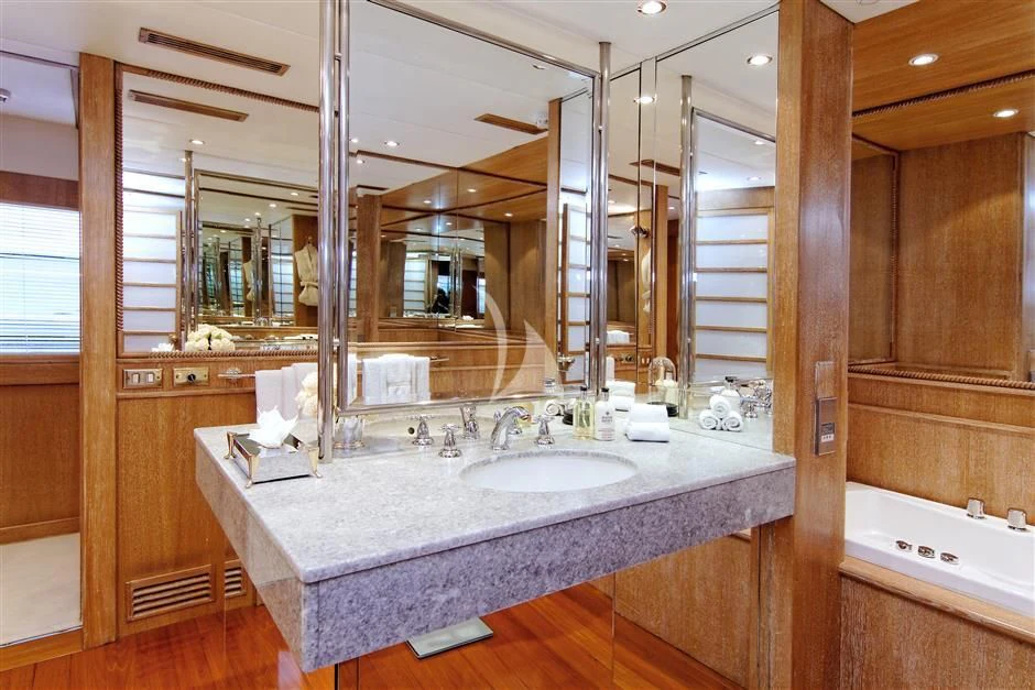 a bathroom with a large countertop aboard SEA LADY II Yacht for Sale