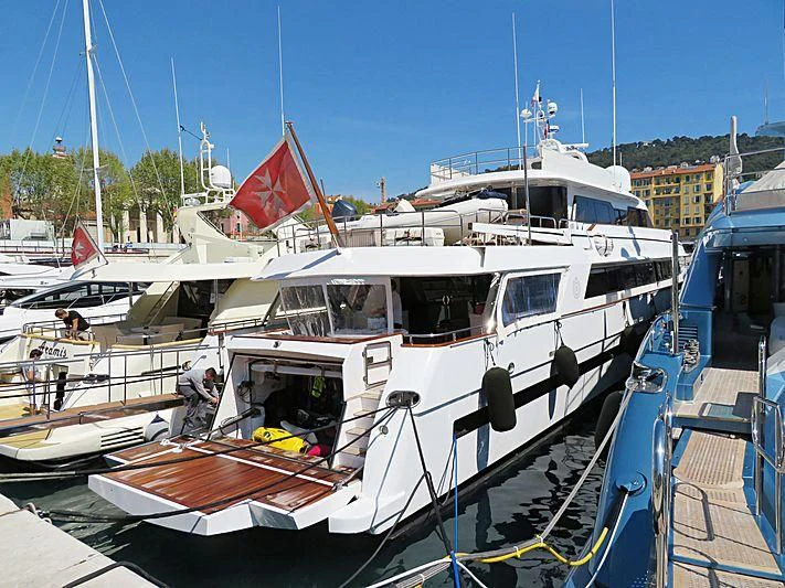 a boat docked at a pier aboard SEA LADY II Yacht for Sale