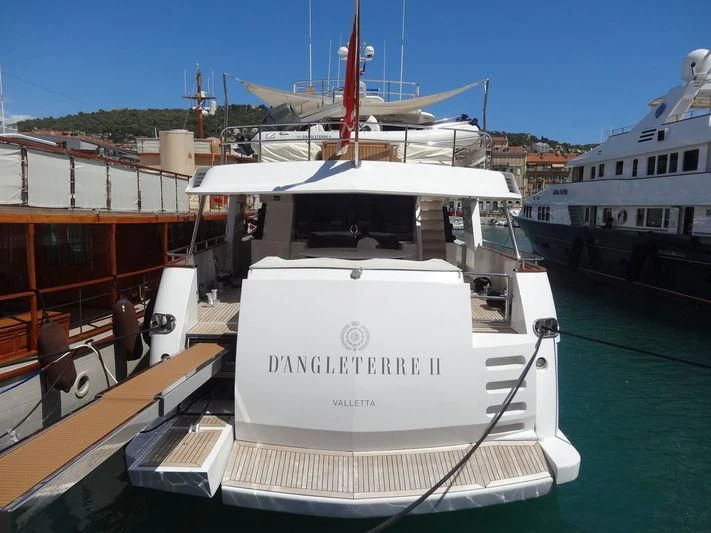 a boat docked at a pier aboard SEA LADY II Yacht for Sale