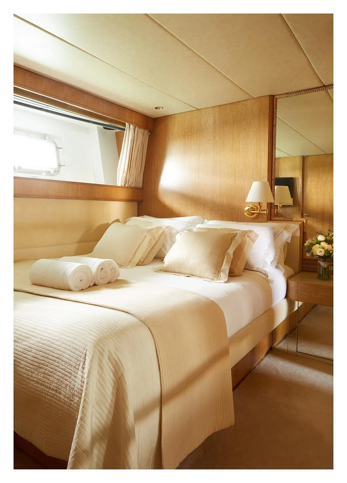 a bed with white sheets aboard SEA LADY II Yacht for Sale