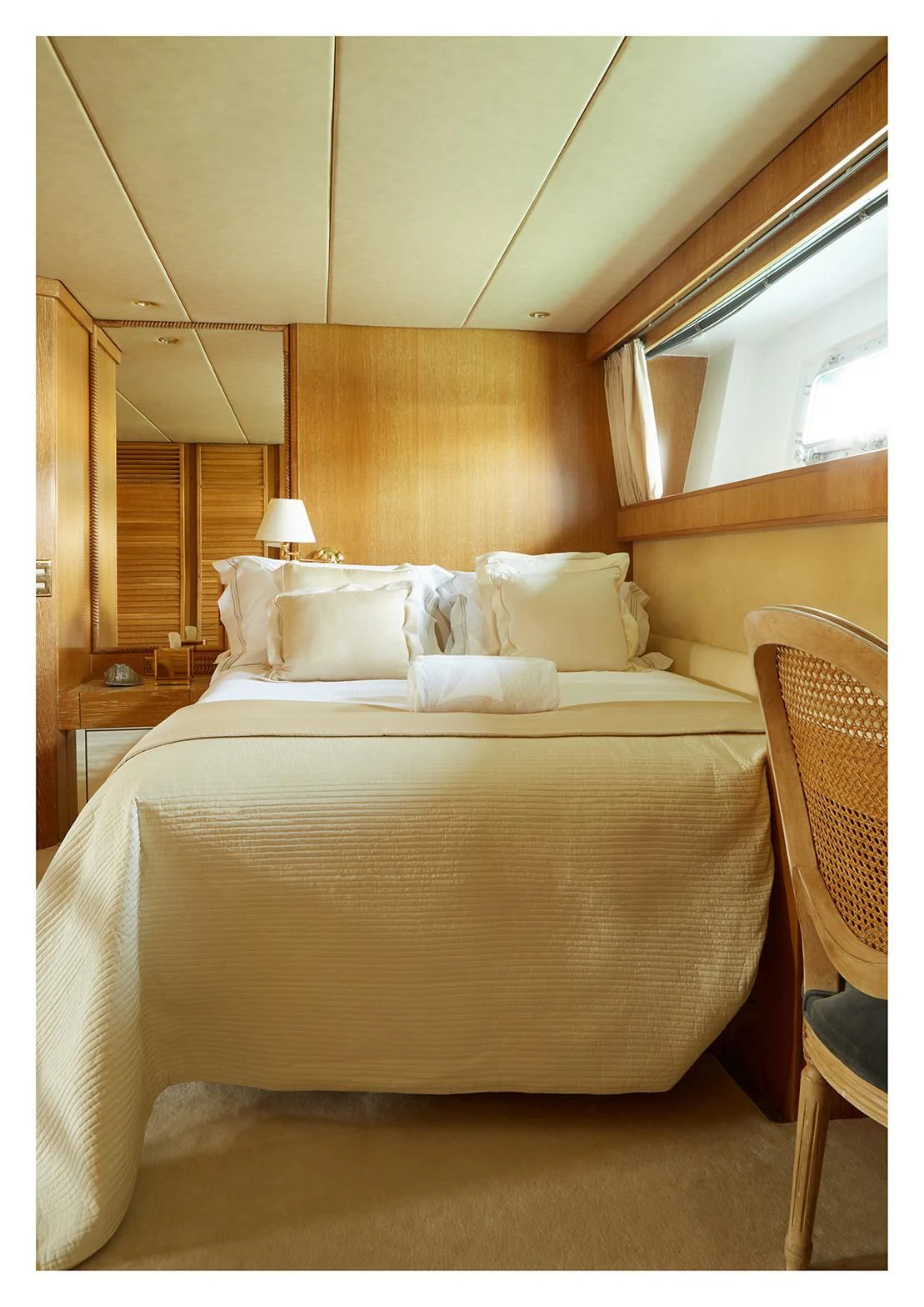 a bed with white sheets aboard SEA LADY II Yacht for Sale
