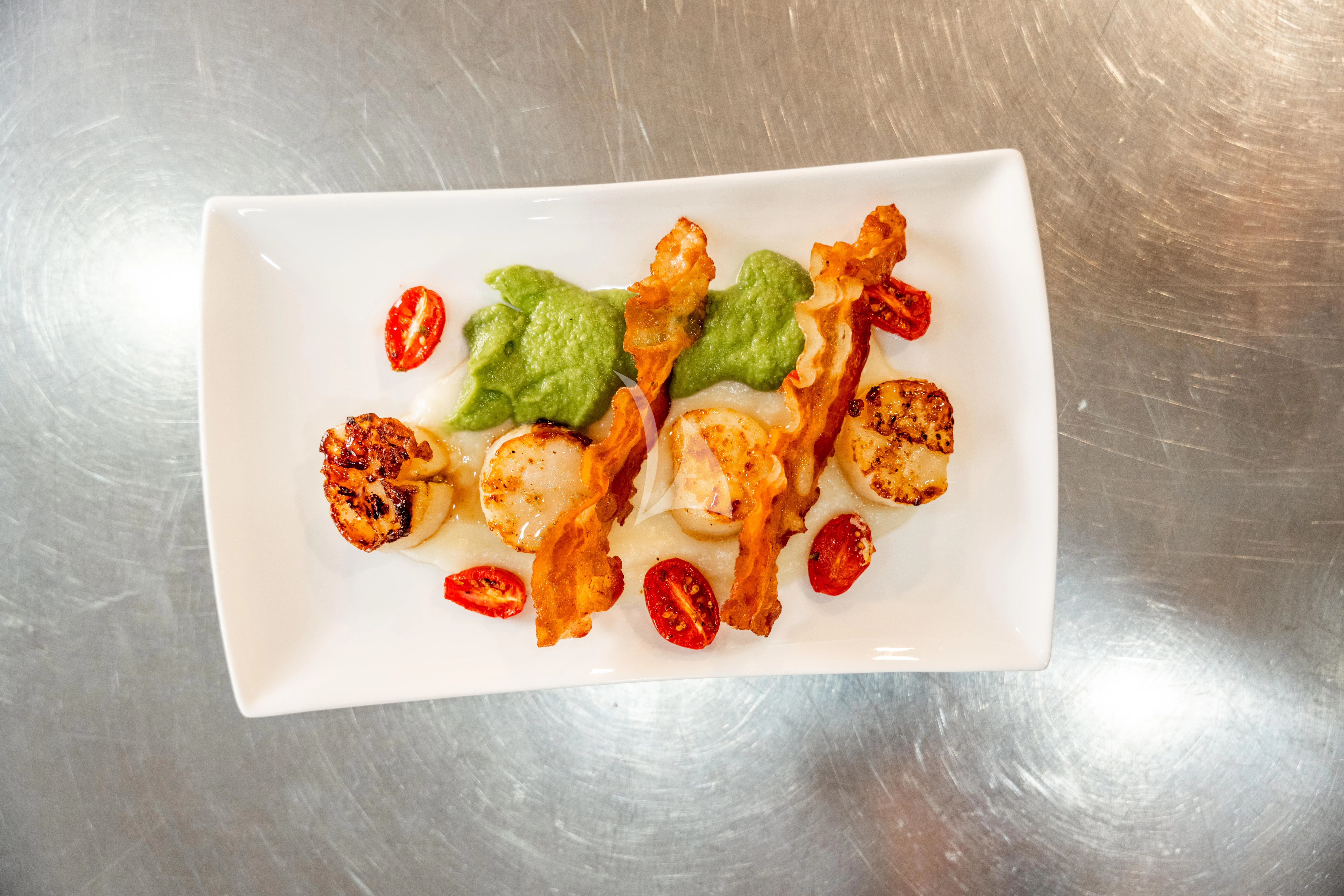 a plate of food aboard SEA LADY II Yacht for Sale