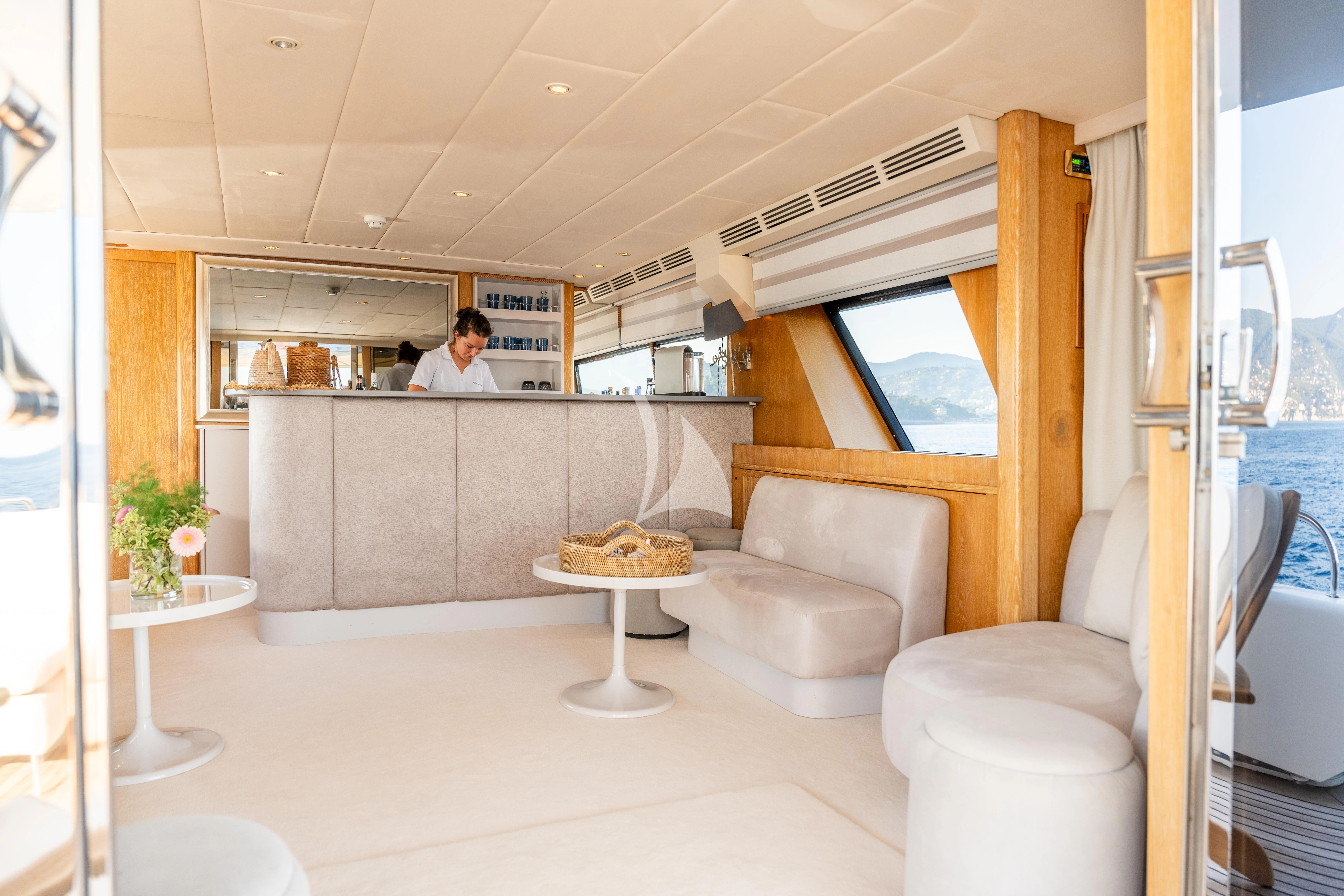 a person sitting in a room aboard SEA LADY II Yacht for Sale