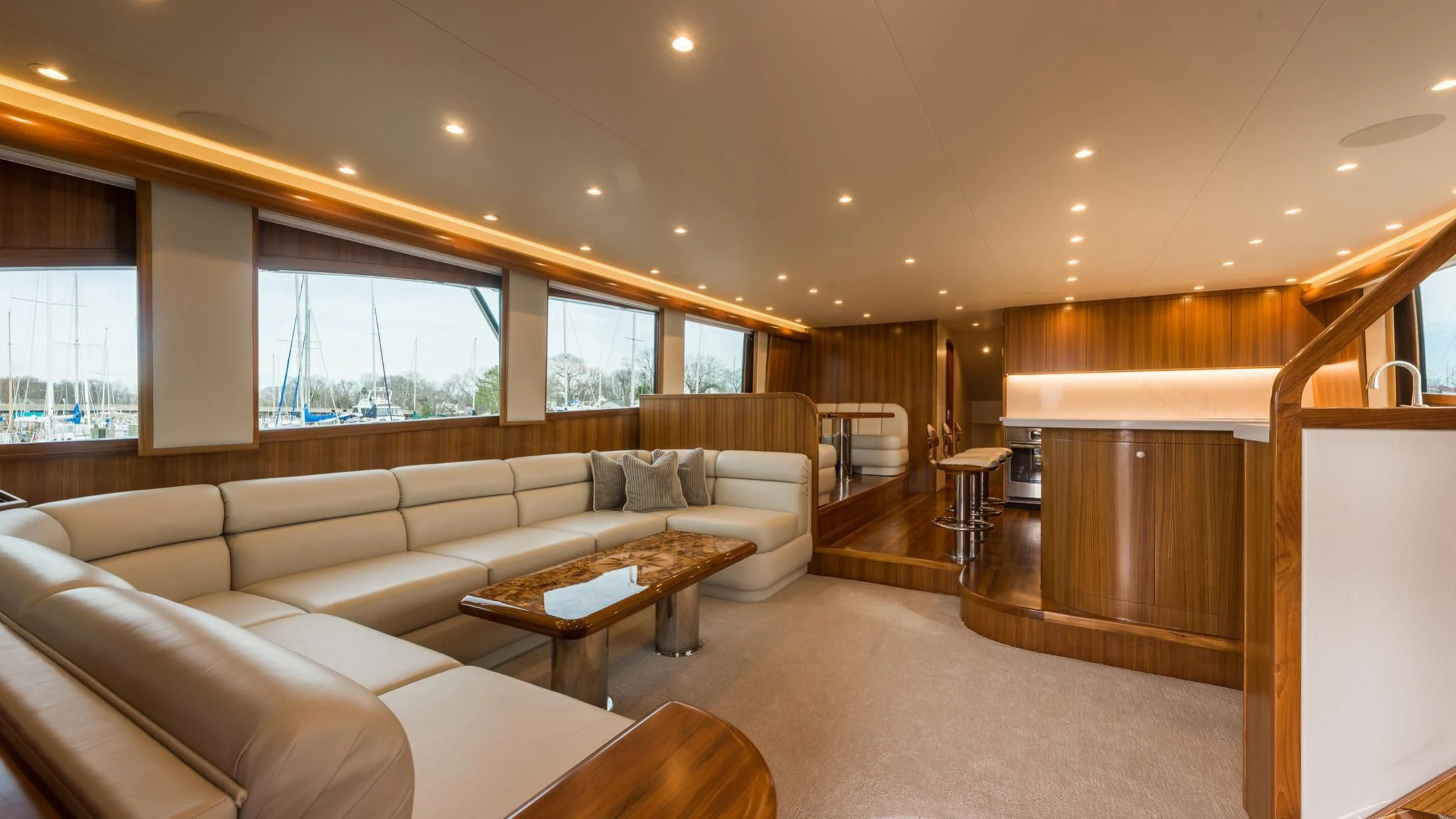 a living room with a couch and a table aboard 18 REELER Yacht for Sale