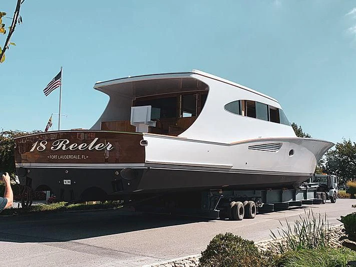 a large white trailer aboard 18 REELER Yacht for Sale