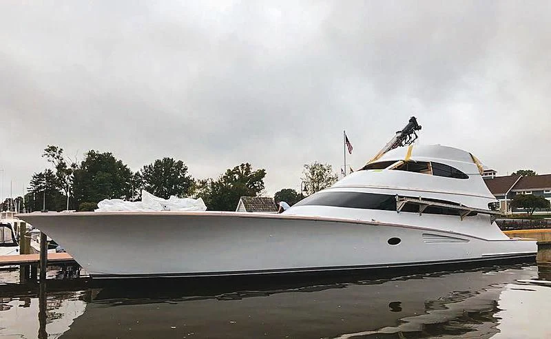 a boat with a person on the top aboard 18 REELER Yacht for Sale