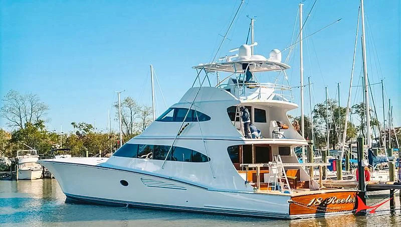 a boat docked in a harbor aboard 18 REELER Yacht for Sale