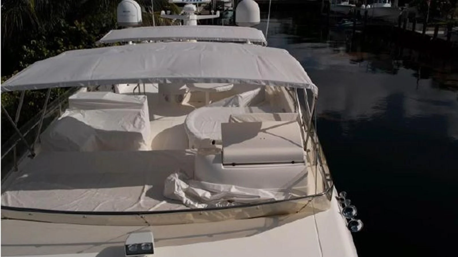 a boat with a cover on the front aboard 2005 760 FERRETTI MOTOR YACHT Yacht for Sale