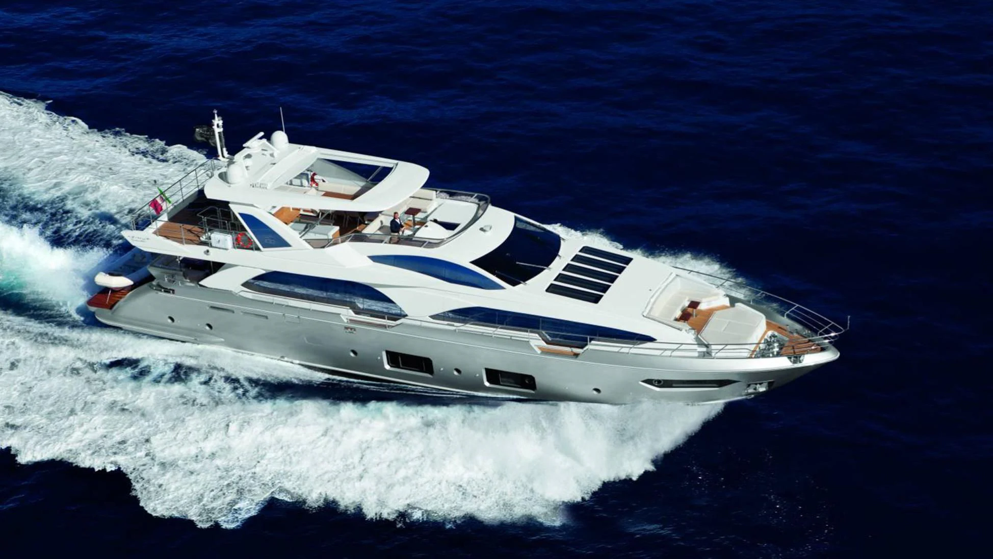 a white yacht with a white front aboard OKTO Yacht for Sale