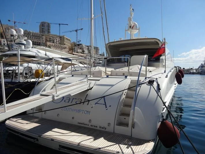 a boat docked at a pier aboard A4 Yacht for Sale