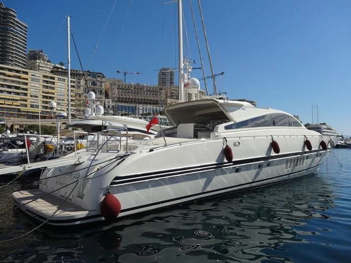 a boat docked in a harbor aboard A4 Yacht for Sale