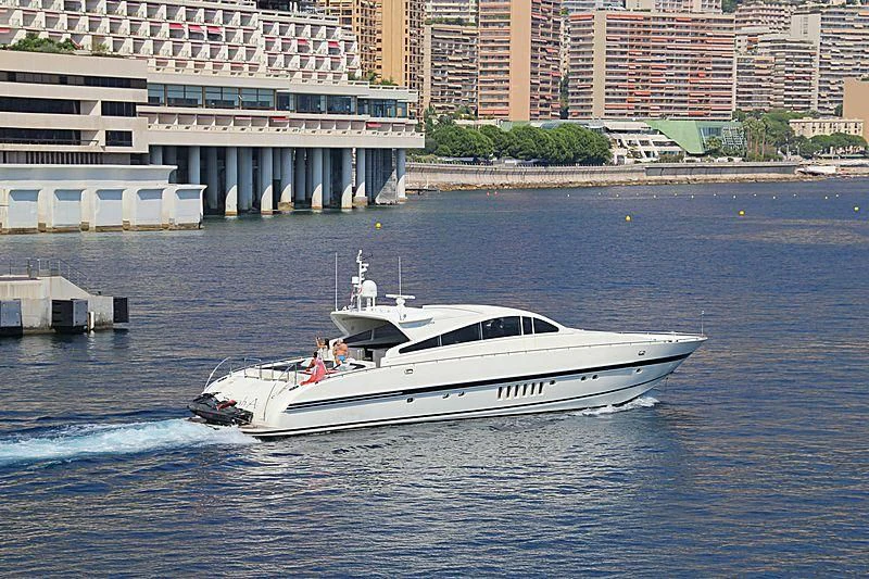 a white boat on water aboard A4 Yacht for Sale