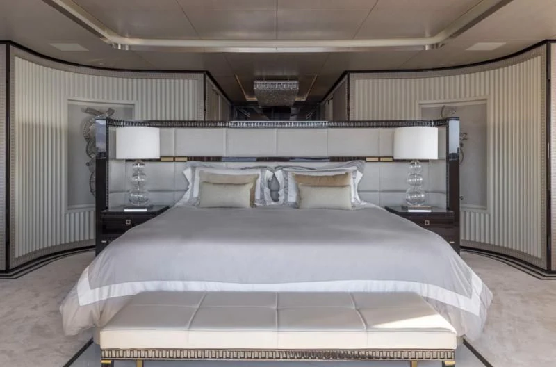 a bed with a white sheet aboard POLESTAR Yacht for Sale