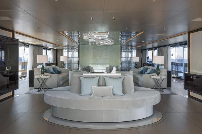 a large living room with a large white couch aboard POLESTAR Yacht for Sale