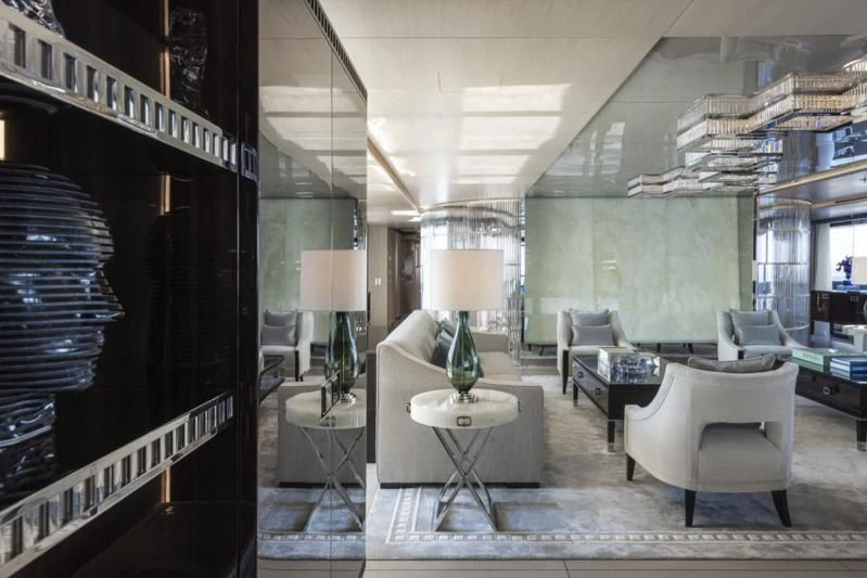 a room with a table and chairs aboard POLESTAR Yacht for Sale