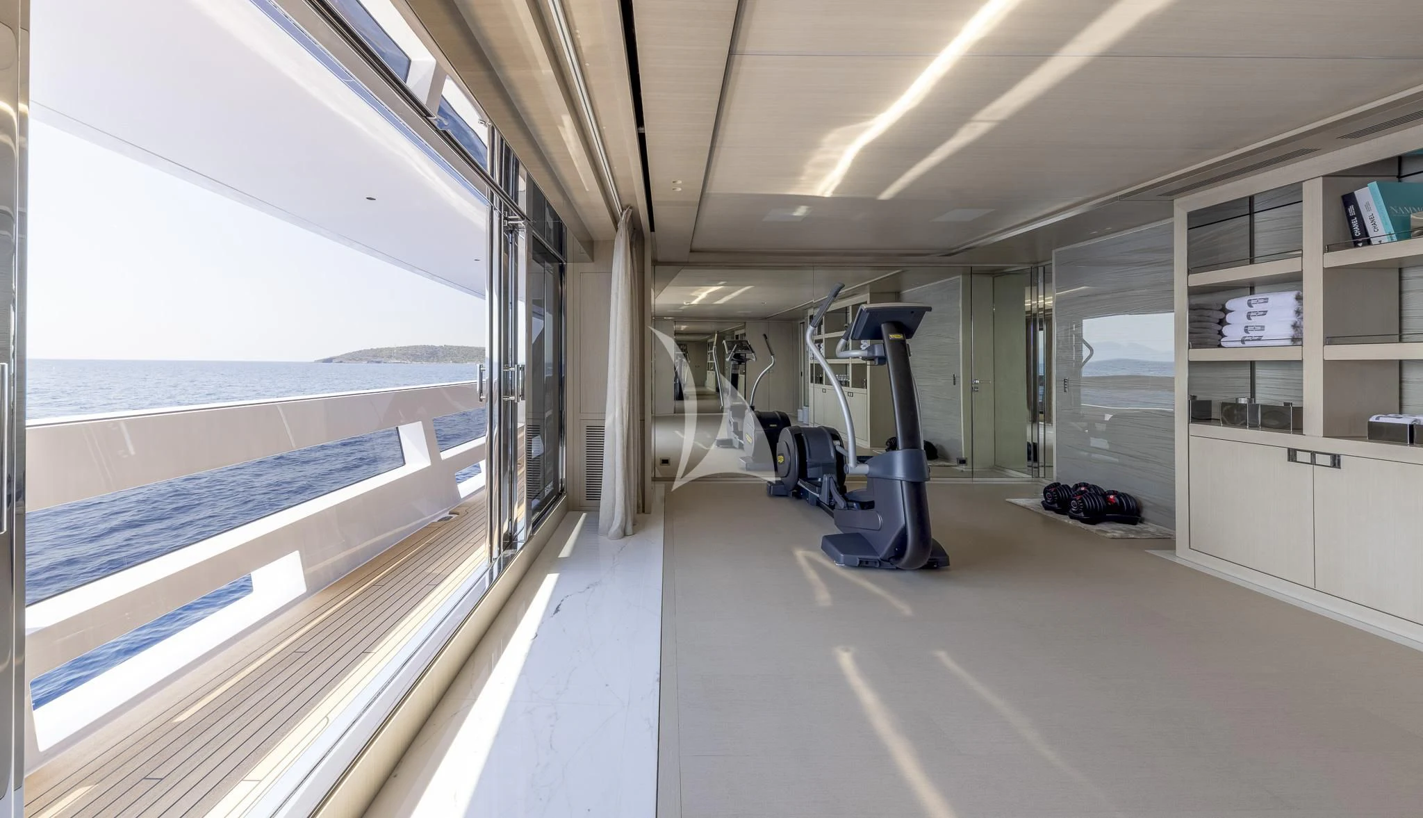 a room with a large window and a view of the ocean aboard POLESTAR Yacht for Sale