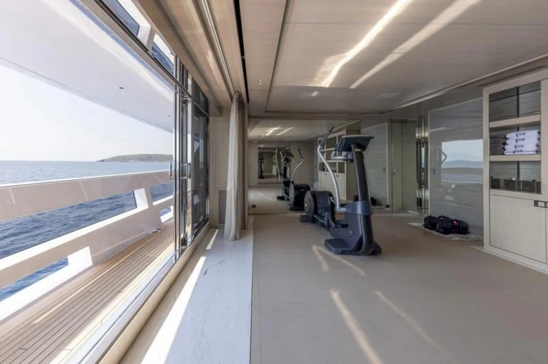 a room with a treadmill and treadmills aboard POLESTAR Yacht for Sale