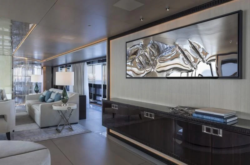 a living room with a large painting aboard POLESTAR Yacht for Sale