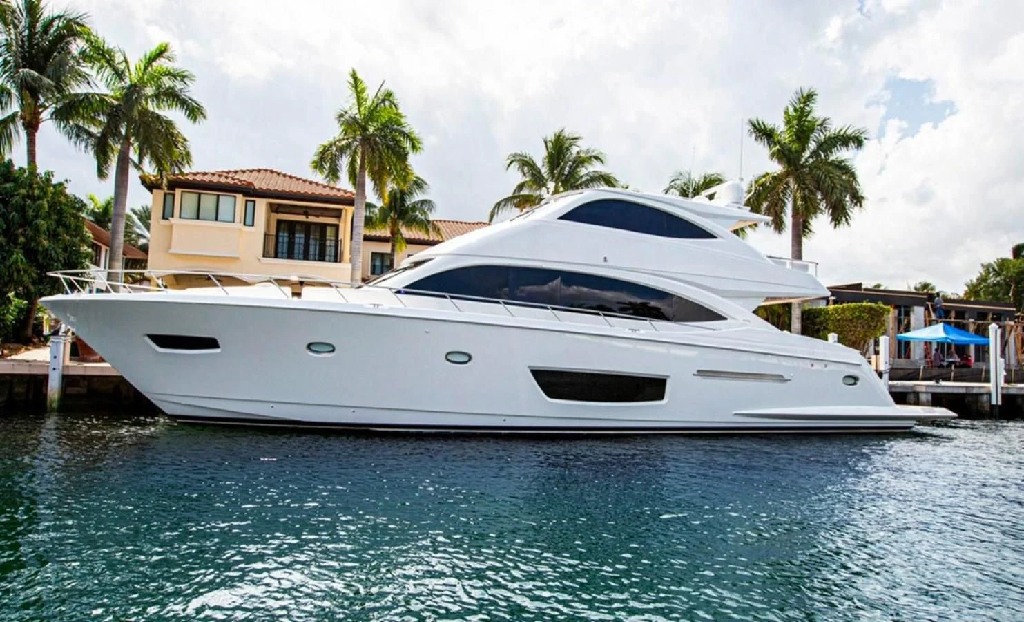 a white yacht on the water aboard KALEEN Yacht for Sale