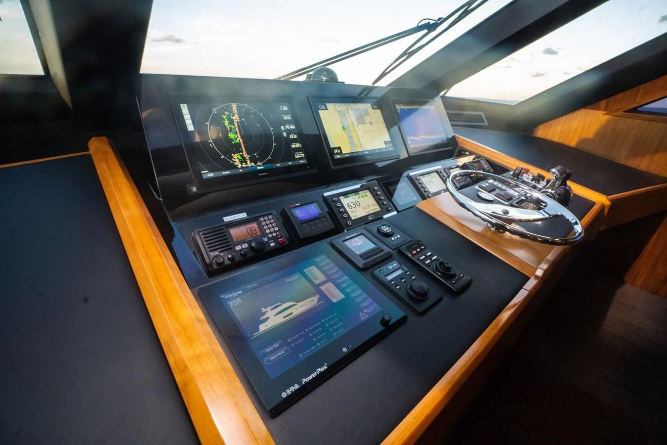 a table with electronic devices aboard KALEEN Yacht for Sale