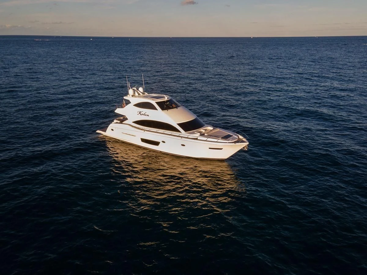 a white boat in the water aboard KALEEN Yacht for Sale